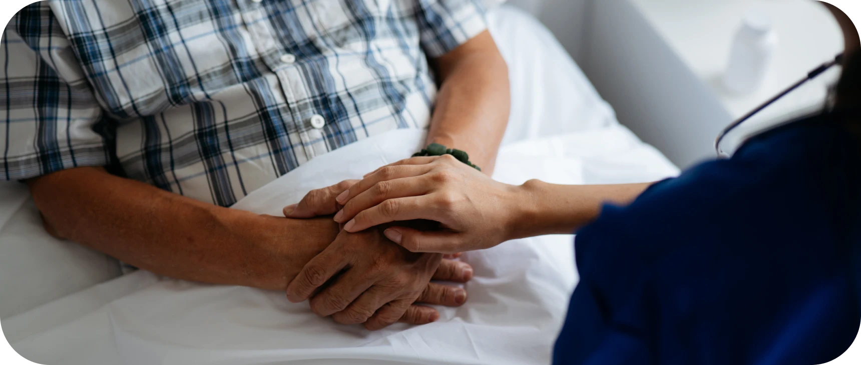 Doctor comforting patient with a gentle touch